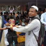 Student receiving prize from DC